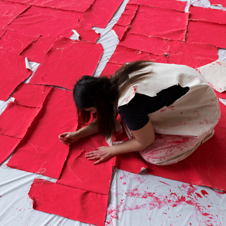 A woman doing art.