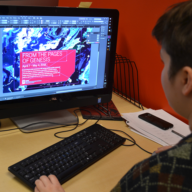 Student designer uses Adobe InDesign on a current project in the MPC.