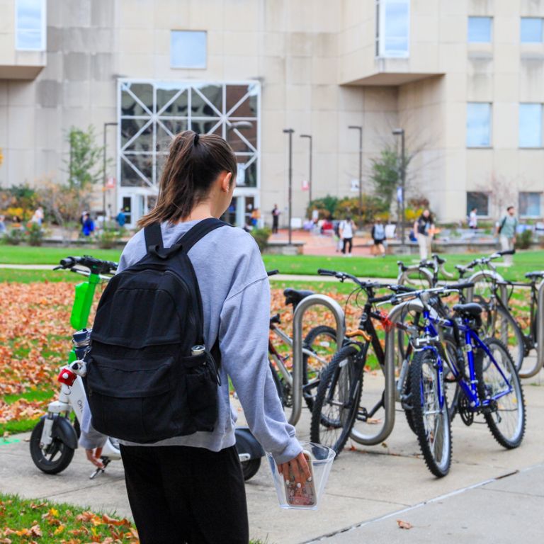 A student walking to the library